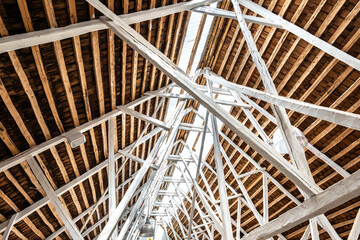 The rustic roof structure of a traditional wooden construction on the island of Chiloe, Chile