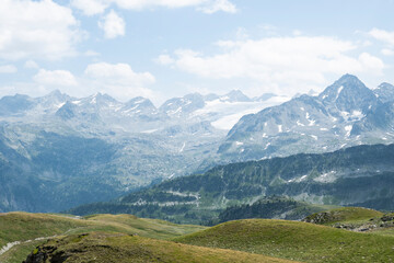 Fototapeta na wymiar Summer Splendor: Peaks, Ice, Rocks, and Lakes. Alps. Aosta Valley. Italy.