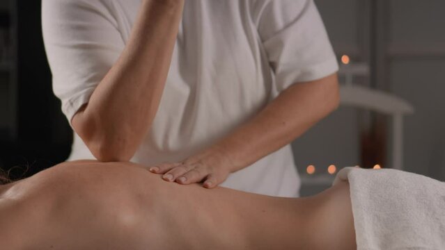 Delve into the deep layers of the muscles during the massage using elbows masseur, which gives a therapeutic healing and restorative effect on the muscles of the back and the whole body. Woman resting
