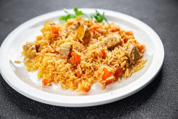 rice pilaf meat tasty fresh pork meat eating cooking appetizer meal food snack on the table copy space food background rustic top view
