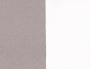 Fototapeta premium Grey and white paper sheet. Smooth paper texture background. Two different kind of paper. Grey carton backdrop. 