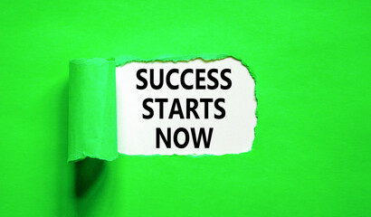 Success starts now symbol. Concept word Success starts now on beautiful white paper. Beautiful green table green background. Business motivational success starts now concept. Copy space.