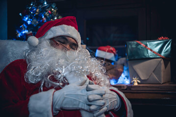 Portrait of Happy santa clause reading a book,Thailand people wear santa claus dress,Sent happiness...