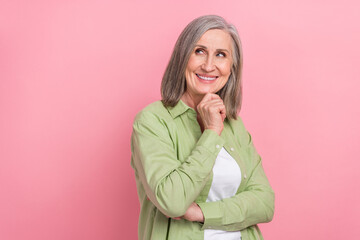 Photo of attractive charming hr director senior woman touch chin minded confident look empty space...