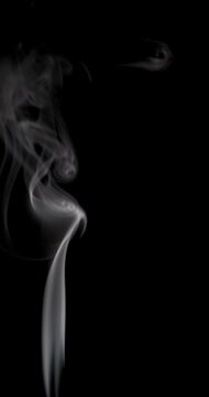 Thin white smoke on a black background