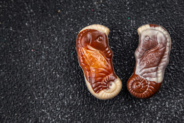 chocolate candy seashells sweet dessert appetizer meal food snack on the table copy space food background rustic top view