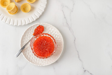 red caviar in the caviar bowl
