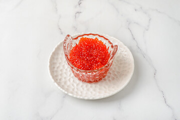 red caviar in the caviar bowl