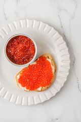 red caviar in a metal jar