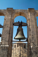 Obraz premium One or bells on bell tower of church Chiesa di San Carlo al Corso in Sicily, Italy