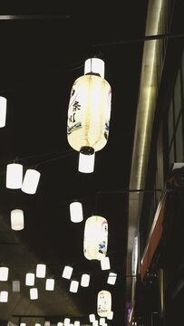 Asian traditional lamps at night vertical video