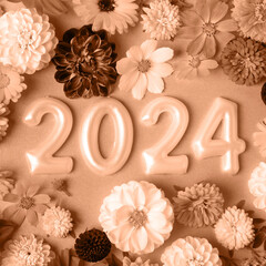 Numbers and dahlia flowers. 2024 new year idea concept. Trendy color of year 2024 - Peach Fuzz. Trendy color palette sample.