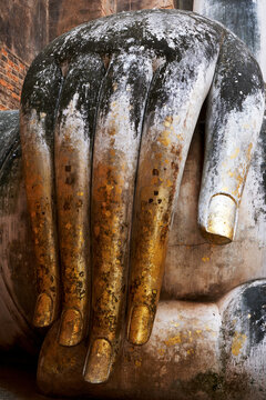 Old statue of buddha in sukhothai, thailand