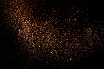 Blurry garland lights on a dark background. Festive Christmas and New Year background. Soft focus....