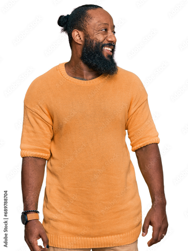 Poster young african american man wearing casual clothes looking away to side with smile on face, natural e