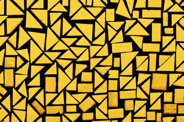 Yellow puzzle background. Geometric shapes pattern. Orange mosaic pieces background. Ceramic decoration texture. Puzzle look graphic design. Vibrant color texture.	