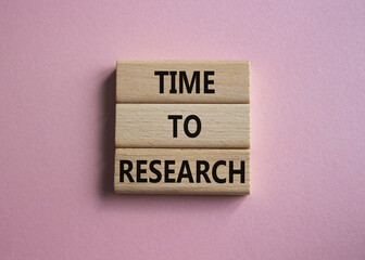 Time to Research symbol. Concept word Time to Research on wooden blocks. Beautiful pink background. Business and Time to Research concept. Copy space