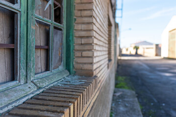 Broken window. Rural abandonment
