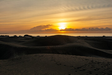 Sand dunes at sunrise