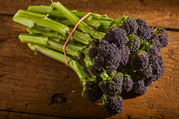 a bunch of raw, purple broccoli grown in Lancaster, PA, USA