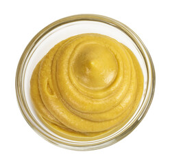 Mustard sauce in glass bowl with seed isolated on white background. Top view. Flat lay