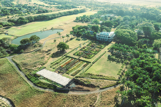 Bel Ombre, Mauritius - 04 November 2022: Aerial view of a luxury restaurant of a golf club at sunrise, Bel Ombre, Savanne, Mauritius.