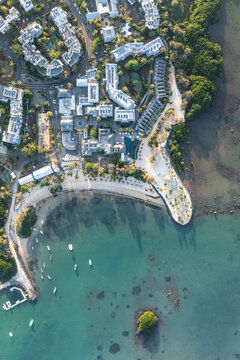 Aerial view of a luxury resort along the coastline with boats in the bay, Opaline, Azuri Village, Rivi&egrave;re du Rempart, Mauritius.