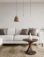 Round accent coffee table near white sofa against stucco wall. Scandinavian home interior design of modern living room in farmhouse
