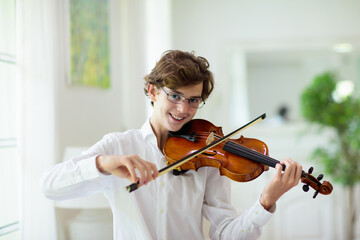 Man playing violin. Classical music instrument.