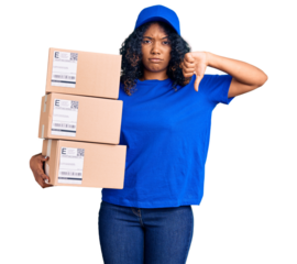 Young african american woman holding delivery package with angry face, negative sign showing dislike with thumbs down, rejection concept