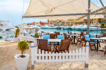 Street cafe at city marina. El Gouna, Egypt - 689827364