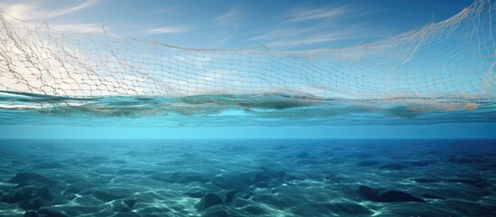 A small trawl net with biological samples is lifted from the sea. Copyspace image. Square banner. Header for website template - obrazy, fototapety, plakaty