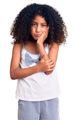 African american child with curly hair wearing casual clothes thinking looking tired and bored with depression problems with crossed arms.