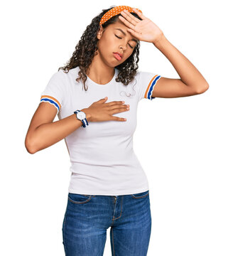 Young african american girl wearing casual clothes touching forehead for illness and fever, flu and cold, virus sick