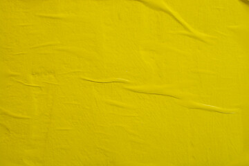 Yellow paper with folds as a background.