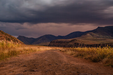 Dirt road leading to the mountains in Lesotho