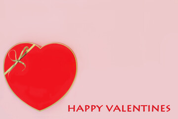 Happy Valentine heart shaped chocolate gift box on pink background. Valentines day design with text.
 
