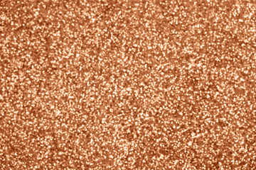 Golden glitter bokeh background. Festive and sparkles. Demonstrating color of 2024 year - peach. - 689841924