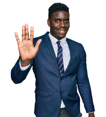 Handsome business black man wearing business suit and tie showing and pointing up with fingers number five while smiling confident and happy.