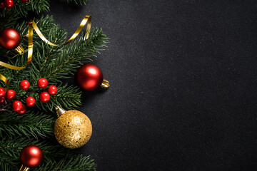 Christmas background, holiday decorations on black. Flat lay with copy space.