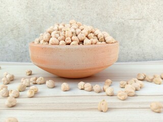chickpeas in a bowl, Raw chickpea beans in bowl , uncooked chickpeas good for healthy eating