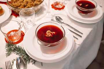 Red borscht with ravioli stuffed with sauerkraut and mushrooms and other traditional Polish Christmas Eve dishes