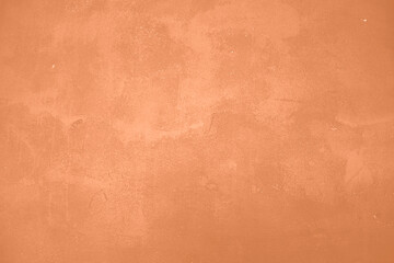 Peach Fuzz toned colour grunge decorative wall background. Art rough stylized texture banner trendy color 2024. Grunge Peach Fuzz color texture - obrazy, fototapety, plakaty
