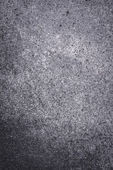 Texture of a concrete wall with cracks and scratches which can be used as a background