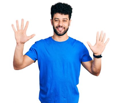 Young arab man with beard wearing casual blue t shirt showing and pointing up with fingers number ten while smiling confident and happy.