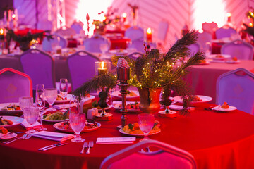 decorated New Year's table with a candle