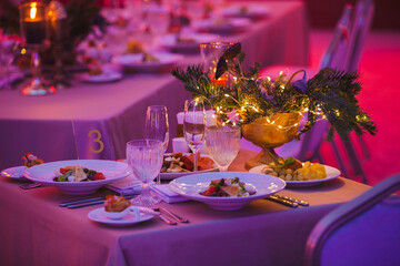 decorated christmas table with candle