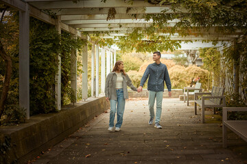 Warm Embrace of Teen Love in the Autumn Park. Capturing Teen Moments: Love Blossoms in Autumn's Embrace. Teenagers in Love: Embracing the Autumn Vibe