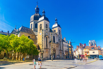 Fototapeta na wymiar Scenic view of ancient Catholic church of Saint-Pierre in center of small french city of Chalon-sur-Saone on sunny summer day.