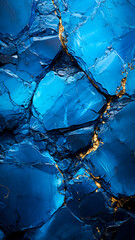 Abstract blue marble background with golden details.